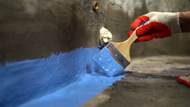 SJ Waterproofing Pros commercial waterproofing team near Grand Blanc, MI